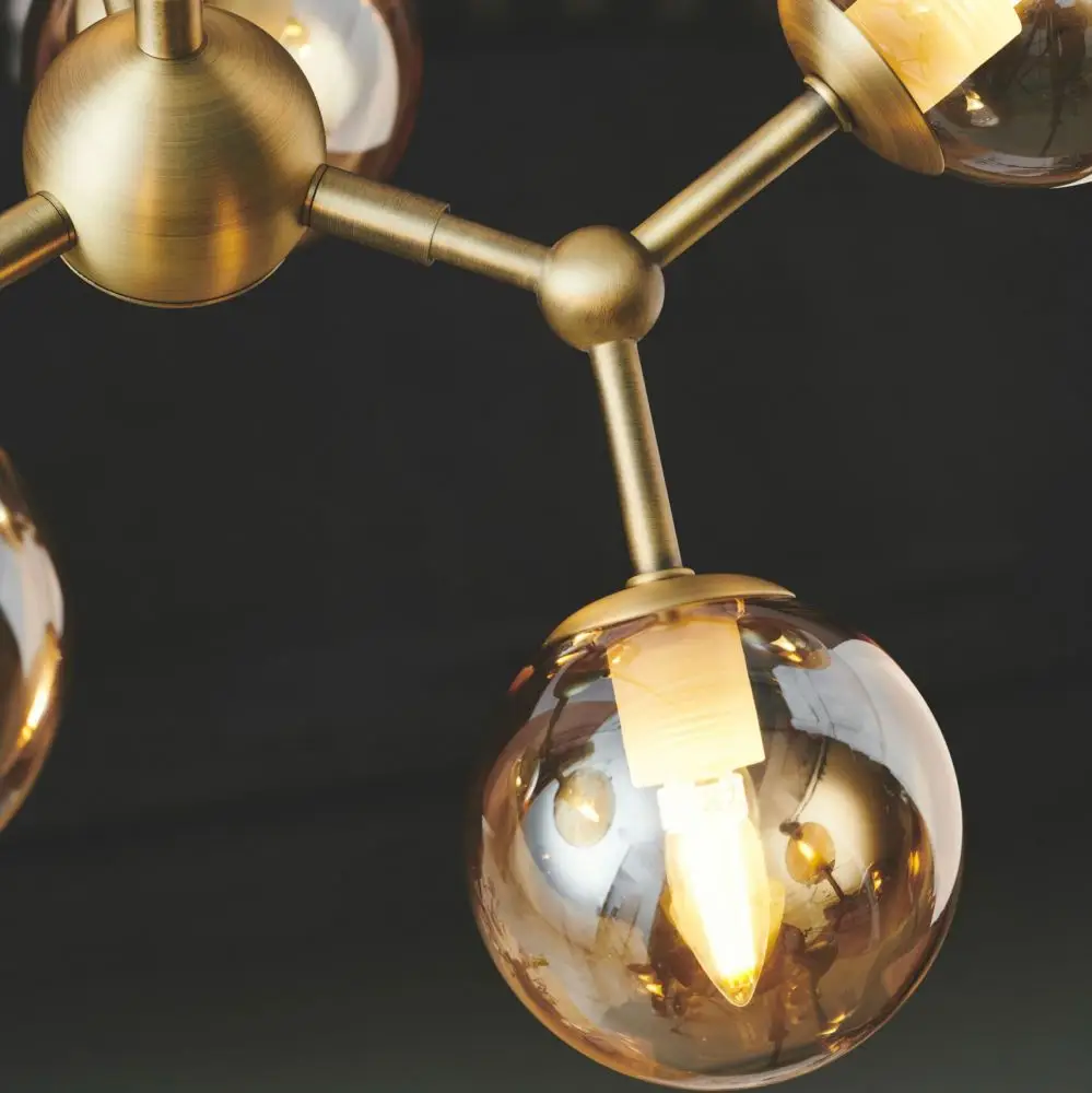 Lampa wisząca Atom vertical amber Halo Design