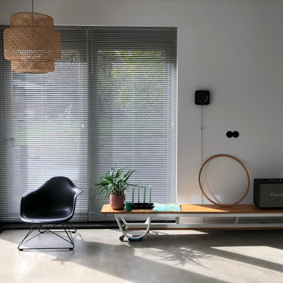 Eames Plastic Armchair LAR orange - black base Vitra