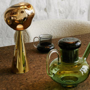 Lampa bezprzewodowa Melt złota Tom Dixon