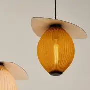 Lampa wisząca do ogrodu Satellite 27 cm musztardowa Gubi