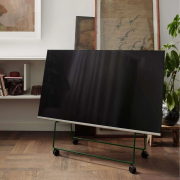 Stojak na kółkach pod telewizor Carry zielony Please Wait to be Seated